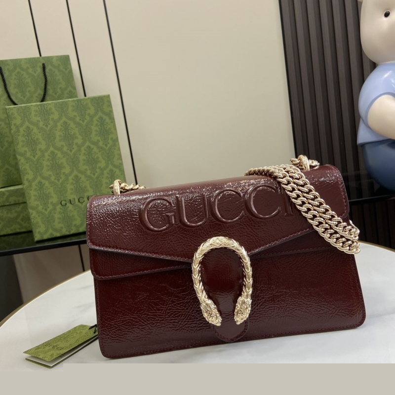 G*u*i top handle bags